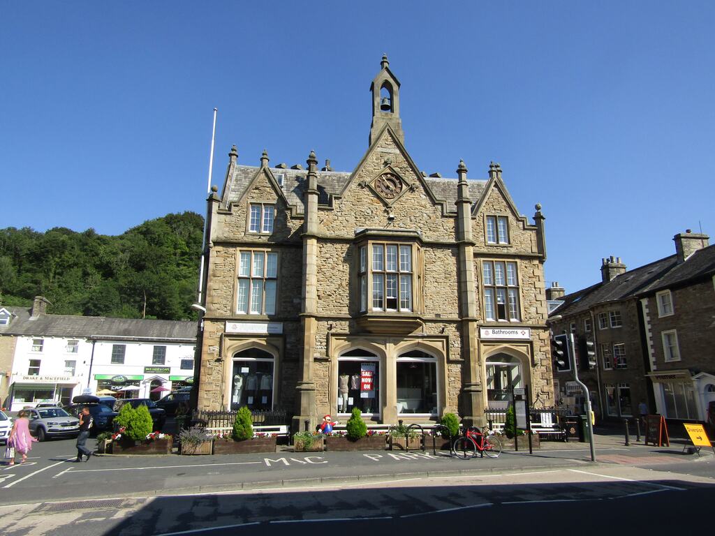 The stone frontage of Settle Town Hall on Duke Street, with the market square in front